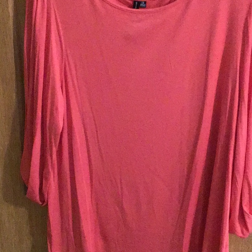 Peach quarter leather shirt.